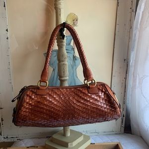 Cole Haan leather basket weave cognac handbag. Brass hardware and dust bag.